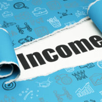 Income written on Blue paper