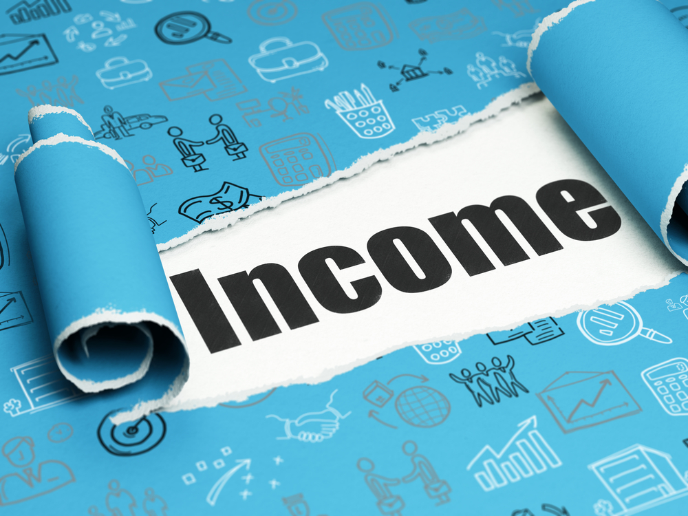 Income written on Blue paper