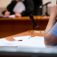 Lawyers listening to the judge in the court room Lawyers listening to the judge in the court room