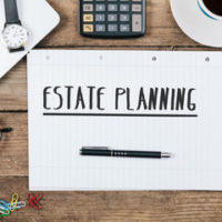 a piece of paper that reads Estate planning a piece of paper that reads Estate planning