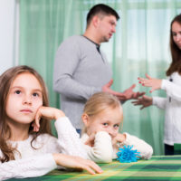 Family of four having quarrel at home