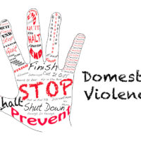 Hand that reads stop Domestic Violence