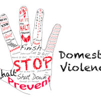 Hand that reads stop Domestic Violence Hand that reads stop Domestic Violence